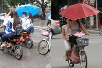 Theo Quy định mới nhất năm 2025: Đi xe máy cầm ô dù có thể bị CSGT ph__ạt tới 14.000.000 đồng, đúng không?